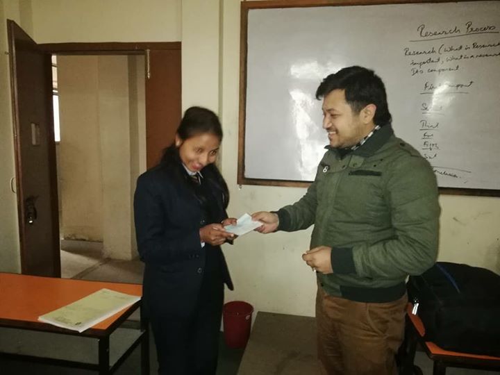 Scholarship Distribution To Sujita Poudel; College Topper Of Bsw Ii